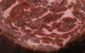 Close-up of raw beef with marbling